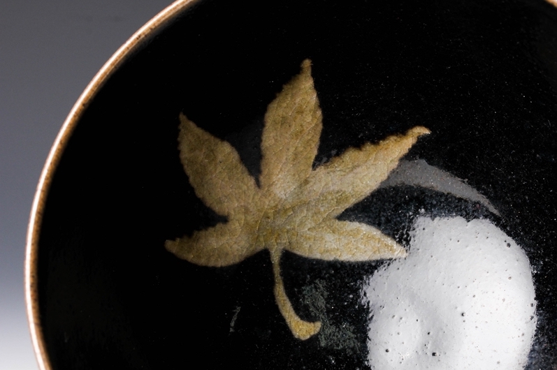 A “Koyo” Tenmoku Tea Bowl with Silk Pouch by Touetsu Kiln